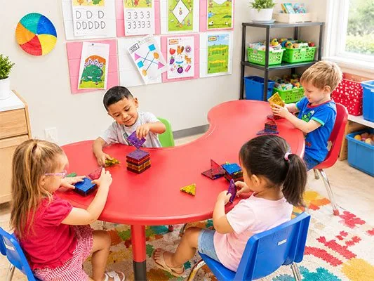 Preschool children building school-readiness skills at Kinder Grove